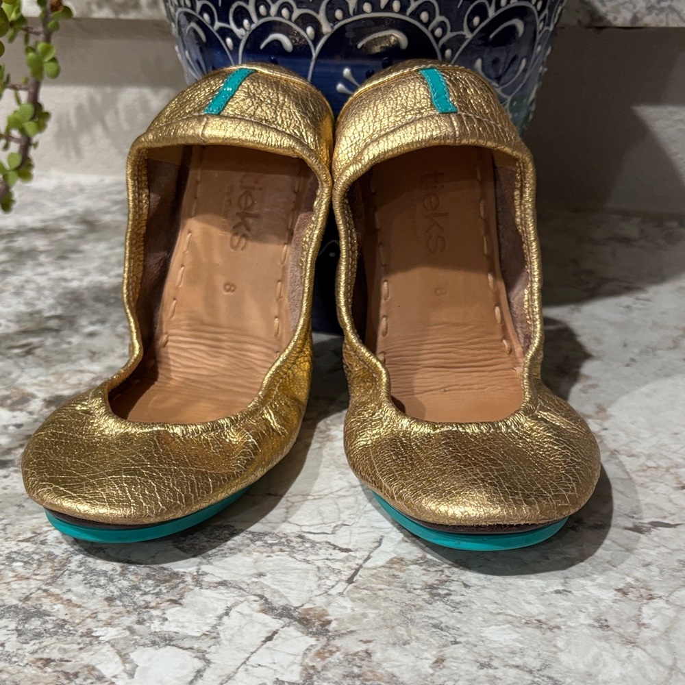 Tieks Gold Flats with Teal Accent